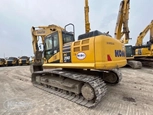 Used Excavator for Sale,Back corner of used Komatsu,Side of used Komatsu Excavator in yard